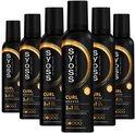 Six bombes aérosols noires avec le logo SYOSS, "CURL MOUSSE" et "3IN1 STYLE CARE DEFINE".
