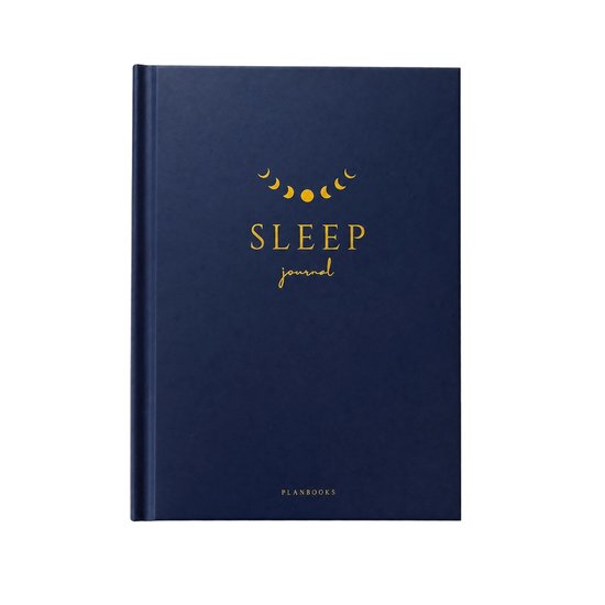 Donkerblauwe 'SLEEP journal' met gouden maanfasen en tekst.
