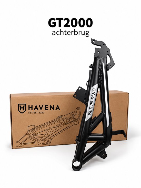 Zwarte achterbrug met witte strepen en 'Off Road Bike' tekst, naast een kartonnen doos met 'HAVENA EST. EST. 2022' logo.