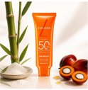 Lancaster Sun Beauty Face Cream SPF 50 crème met bamboe, palmolie en een schaaltje met poeder.