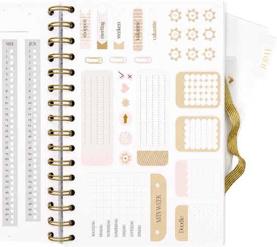 Agenda met stickers, waaronder "shoppen", "meeting", "werken", "vakantie" en icoontjes.