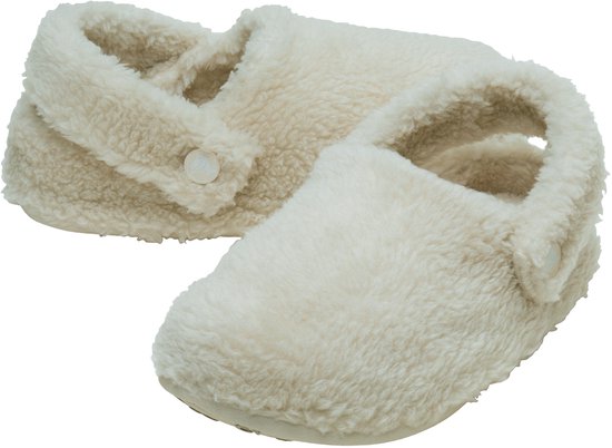 Sabots Crocs crème pour enfants avec doublure en peluche et fermeture à bouton-pression.