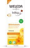 Verpakking WELEDA Baby billenbalsem met goudsbloemen en een "NEW"-sticker. Tekst "Parfum-vrij" in groen en "Calendula" in oranje.