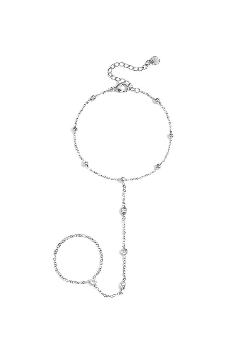 Handchain met ovale en ronde steentjes - Goudkleur