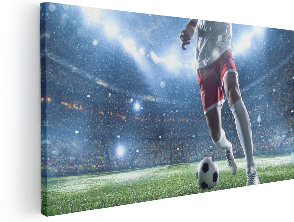 Artaza Canvas Schilderij Voetbal Speler Met De Bal In Een Druk Stadion - 140x70 cm - Groot - Wanddecoratie Woonkamer - Schilderijen - Muurdecoratie