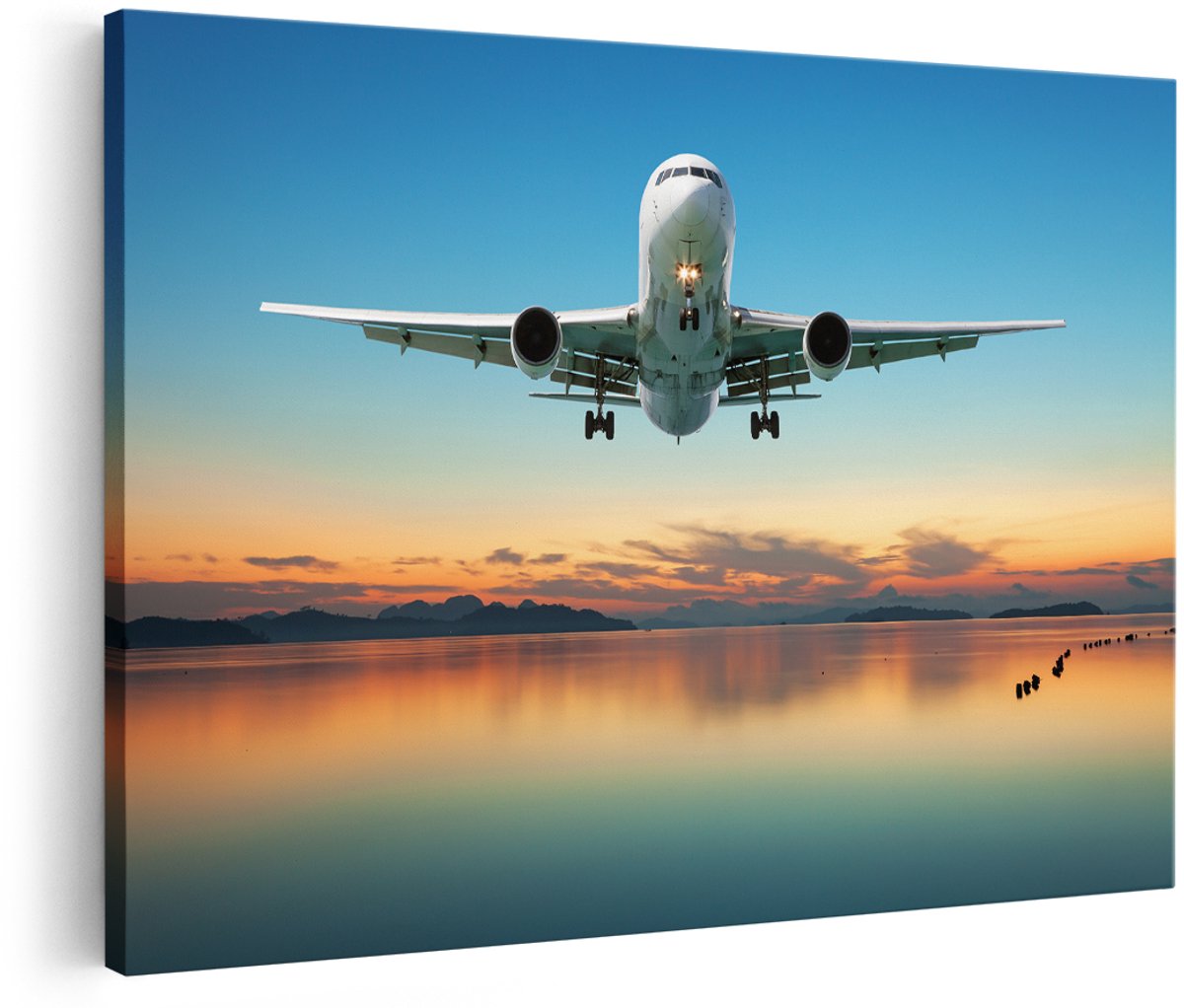 Artaza Canvas Schilderij Vliegtuig Vliegt Boven Een Kleurrijke Zee - 180x120 cm - Groot - Wanddecoratie Woonkamer - Schilderijen - Muurdecoratie