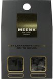 Grijze verpakking met gouden logo, tekst 'HET LEKKERSTE DROPJE OM TE GEVEN' en vensters met Peperdrop en Salmiak truffels.