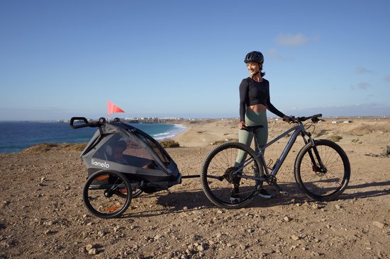 Lionelo Cama Fietskar 2in1 - Fiets aanhanger + Wandelwagen voor 2 Kinderen - 360° Voorwiel - 60L Bagageruimte - Full Vering - 5-Punts Gordels - Grote Luchtbanden - UPF50+ & Waterafstotend - Kinderfietskar & Buggy Inklapbaar - Kinderwagen - Tot 2x22kg — afbeelding 5