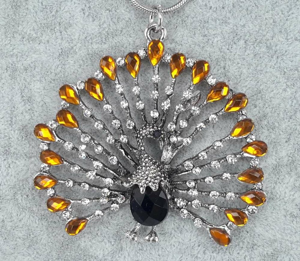 hanger - pralende pauw - witte strass - oranje druppel strass