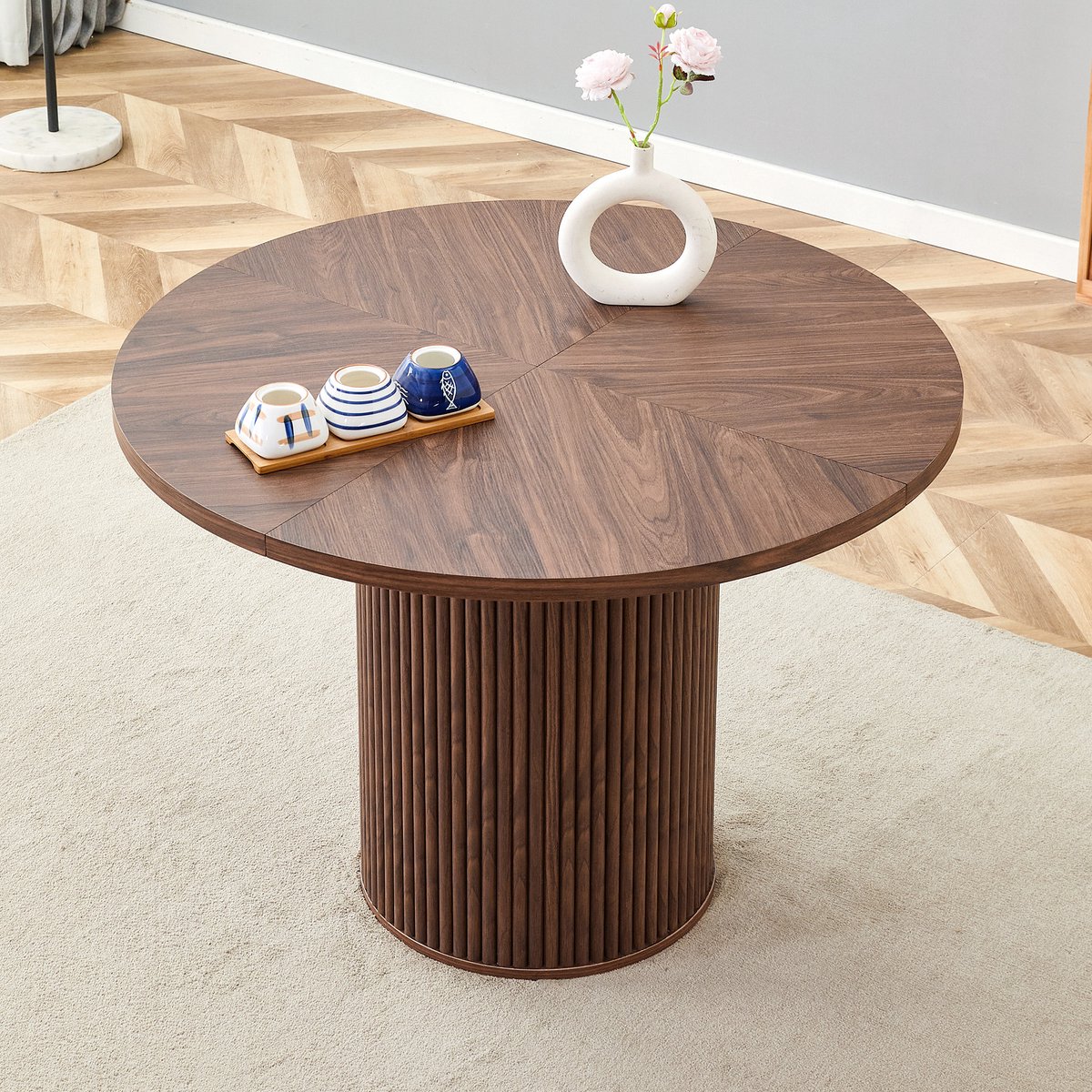 MEUNIQ ronde eettafel 100 cm, walnootkleurige MDF tafel met 4-delig tafelblad, cilindrische zuilvoet en opbergruimte, 76 cm hoog, voor eetkamer of keuken