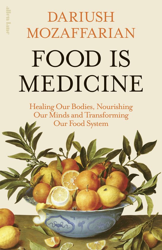 Livre "Food is Medicine" avec sur la couverture un bol plein d'agrumes, décoré de verdure.