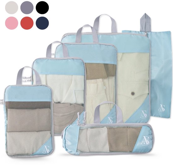 Set van zes mintgroene compressie packing cubes met lichtblauwe accenten en gaasfronten.