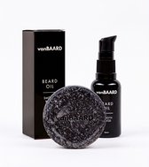 VanBAARD baardolie en shampoo set. Zwarte verpakking en fles met pompje, ronde donkergrijze shampoo bar.
