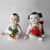 Geluksbrenger twee kleine happy boeddha baby's