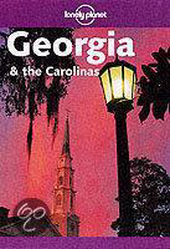 Lonely Planet Georgia & the Carolinas reisgids met een straatlantaarn en kerktoren bij zonsondergang.