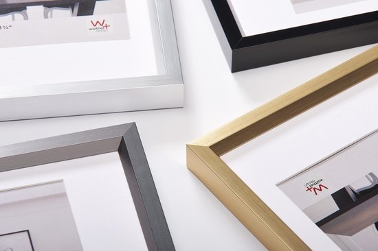 Vier verschillende lijsten in zilver, grafiet, goud en zwart.