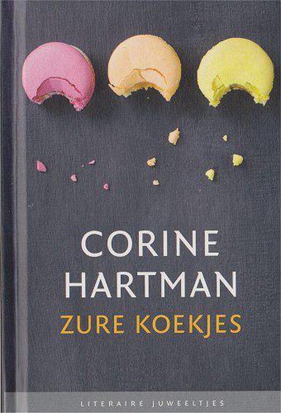 Boekcover met de titel "Zure Koekjes" van Corine Hartman. Drie macarons, roze, geel en oranje, liggen boven de titel.