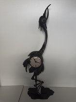 Vogel klok mooie zwarte  aparte GROTE vogel met aan beide zijden een klok dus 2 klokken vogel met een wiebelnek  van  metaal Evergreen Home Decoration  80x28x18 cm