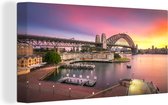 Canvas schilderij 160x80 cm - Wanddecoratie Zonsopgang achter de Sydney Harbour Bridge in Australië - Muurdecoratie woonkamer - Slaapkamer decoratie - Kamer accessoires - Schilderijen