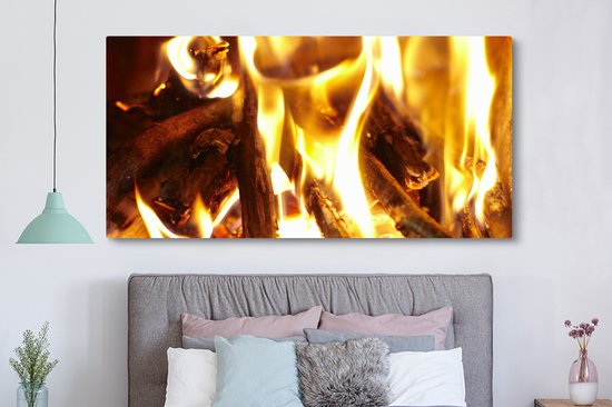 Tableau sur toile Une cheminée avec feu - 160x80 cm - Décoration murale