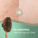 Vergelijking van huidtexturen, met een houten borstel. 'De oplossing voor een stralende huid'.