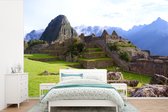 Behang - Fotobehang De pre-Colombiaanse stad Machu Picchu in Peru - Breedte 525 cm x hoogte 350 cm