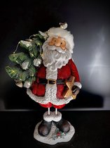 Santa with Christmas tree LED lights - Kerstman met kerstboom 63 cm hoog - glitters - eindejaarcollectie - keramiek - decoratiefiguur - interieur - geschikt voor binnen - cadeau -