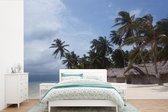 Behang - Fotobehang Houten strand hutten bij de San Blas-eilanden in Panama - Breedte 330 cm x hoogte 220 cm