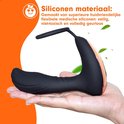 Zwarte prostaat vibrator, gemaakt van siliconen, in een handpalm.