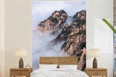 Behang - Fotobehang Mist in de bergen - Breedte 195 cm x hoogte 300 cm