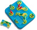Dinosaurus spel 'Mystic Islands' met blauw speelbord, 3 rode en 3 groene dinosauriërs en palmboompjes. Extra stukje los.
