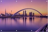 Zonsopkomst zorgt voor een paarse gloed in Dubai - Foto op Tuinposter - 120 x 80 cm