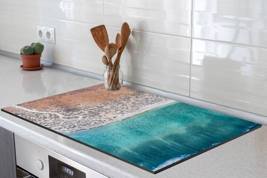 KitchenYeah® Inductie beschermer 81.2x52 cm - Blauw water en mooi strand bij de Kust van Ningaloo - Kookplaataccessoires - Afdekplaat voor kookplaat - Inductiebeschermer - Inductiemat - Inductieplaat mat