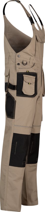 Vue latérale d'une salopette de travail beige avec des détails noirs et des pocons.