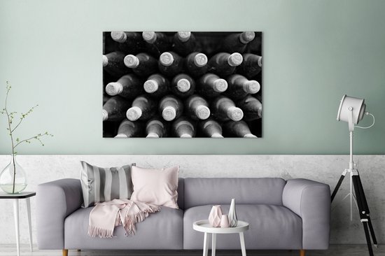 Tableau sur toile Bouteilles de vin dans la cave - noir et blanc - 120x80 cm - Décoration murale