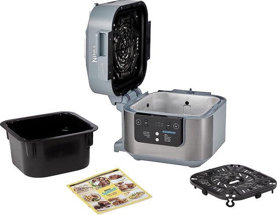 Grijze Ninja Speedi multicooker met open deksel, zwarte binnenpan en grillrooster. Handleiding ernaast.