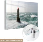 MuchoWow® Glasschilderij 120x80 cm - Schilderij acrylglas - De Franse Vuurtoren van la Jument tussen de golven - Foto op glas - Schilderijen