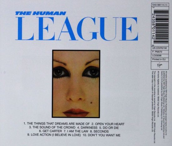 Close-up van een gezicht met dramatische oogmake-up en rode lippen. De bandnaam 'THE HUMAN LEAGUE' staat bovenaan.
