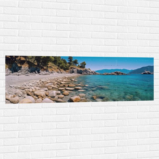 Muursticker - Zee - Strand - Bomen - Stenen - 150x50 cm Foto op Muursticker