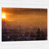 Muursticker - Huizen - Zonsondergang - Sneeuw - Winter - 100x75 cm Foto op Muursticker