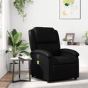 Zwarte fauteuil met massagefunctie in een woonkamer, naast een bijzettafel met plant.