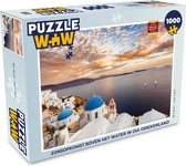 Puzzel Zonsopkomst boven het water in Oia Griekenland - Legpuzzel - Puzzel 1000 stukjes volwassenen