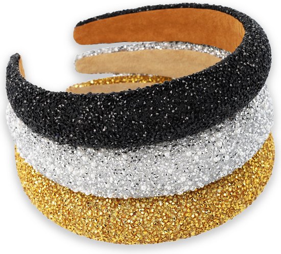 Stapel brede haarbanden in zwart, zilver en goud, allemaal met glitters.