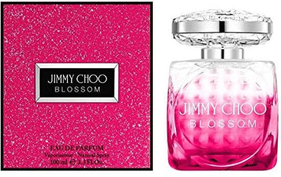 Set van Jimmy Choo Blossom: roze glinsterende doos naast de glazen parfumfles.