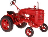 Metalen rode tractor