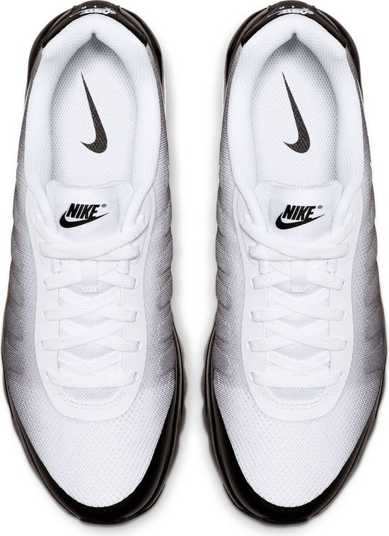 white & black air max invigor trainers