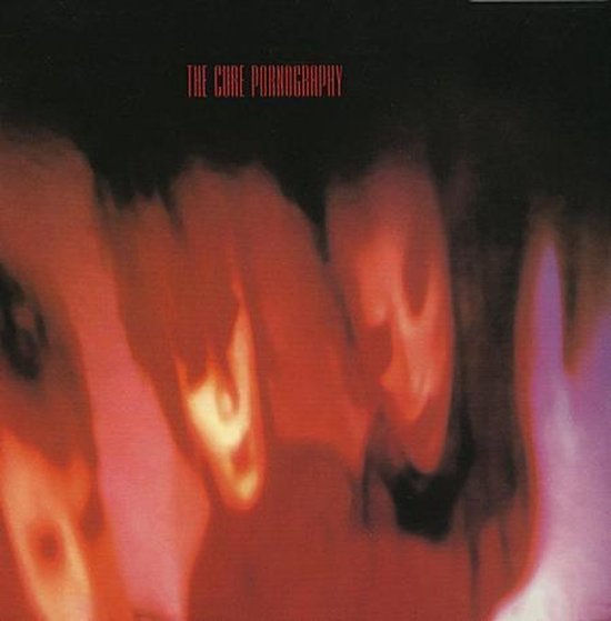 Albumhoes van 'The Cure Pornography' met rode en paarse abstracte beelden.