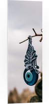 PVC Schuimplaat- Nazar Amulet Hangend aan Smalle Tak - 40x120 cm Foto op PVC Schuimplaat