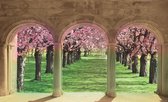 Fotobehang - Vlies Behang - 3D Uitzicht op de Bomen met Bloemen door de Pilaren - 208 x 146 cm