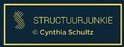 Donkerblauwe planner kaft met goudkleurig logo "STRUCTUURJUNKIE" en "C Cynthia Schultz".